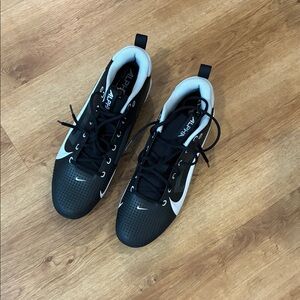 Nike Black and White Athletic Cleats Shoes